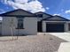 Charming single-story home featuring a neutral color palette and a two-car garage, offering comfort and curb appeal at 47253 W Pecan Woods --, Maricopa, AZ 85139