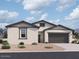 Charming single-story home featuring a neutral color palette and a two-car garage, offering comfort and curb appeal at 47253 W Pecan Woods --, Maricopa, AZ 85139