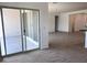 Bright and open floor plan with sliding door access to the outside at 47253 W Pecan Woods --, Maricopa, AZ 85139