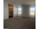 Large bedroom with natural light from two windows at 47748 W Moeller Rd, Maricopa, AZ 85139