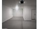 Spacious three car garage with sealed concrete floors at 47748 W Moeller Rd, Maricopa, AZ 85139