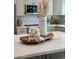 Kitchen island features quartz countertop, decorative vase, and serving tray at 5011 E Nisbet Rd, Scottsdale, AZ 85254