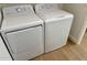 Convenient laundry area featuring a Hotpoint washer and dryer set in a bright space at 5011 E Nisbet Rd, Scottsdale, AZ 85254