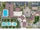Bird's-eye view of the community pools, tennis courts, and beautifully maintained grounds at 5233 N 207Th Dr, Buckeye, AZ 85396