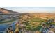 Expansive aerial view of the community golf course and surrounding desert landscape at 5233 N 207Th Dr, Buckeye, AZ 85396