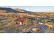 Charming community park building with desert landscaping and mountain backdrop at 5233 N 207Th Dr, Buckeye, AZ 85396