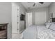 Cozy bedroom featuring contemporary style and access to the attached bathroom at 5233 N 207Th Dr, Buckeye, AZ 85396