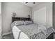 Bedroom with a contemporary bed frame and neutral-colored walls at 5233 N 207Th Dr, Buckeye, AZ 85396