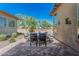 Outdoor seating area with a dining table and comfortable chairs, perfect for entertaining at 5233 N 207Th Dr, Buckeye, AZ 85396