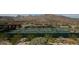 Community pickleball courts surrounded by desert landscape with mountain views at 5233 N 207Th Dr, Buckeye, AZ 85396