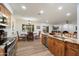 An open floor plan featuring a well-equipped kitchen with modern appliances and a charming dining area at 5334 E Everett Dr, Scottsdale, AZ 85254