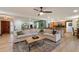 Expansive living room seamlessly connecting to the kitchen and recreational area, creating an inviting atmosphere at 5334 E Everett Dr, Scottsdale, AZ 85254