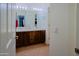 Bright bathroom with double vanity, offering ample space and modern fixtures at 5425 W Harwell Rd, Laveen, AZ 85339