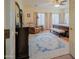 Spacious primary bedroom featuring a sitting area, plush carpeting, and ample natural light at 5425 W Harwell Rd, Laveen, AZ 85339