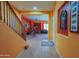 Inviting entryway featuring tile flooring and an open staircase to the upper level at 5425 W Harwell Rd, Laveen, AZ 85339