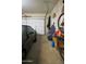 Neat garage showcasing storage solutions, a car, and bicycles at 5425 W Harwell Rd, Laveen, AZ 85339