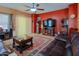 Comfortable living room with a large TV and ample seating space at 5425 W Harwell Rd, Laveen, AZ 85339