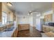 The bright kitchen showcases granite countertops, wood cabinets, and stainless steel appliances at 646 W Grove Cir, Mesa, AZ 85210