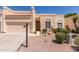 Charming single-story home featuring a two-car garage and low maintenance desert landscaping at 7006 E Jensen St # 40, Mesa, AZ 85207