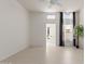 Bright living room with large windows, ceiling fan and modern tile flooring at 7006 E Jensen St # 40, Mesa, AZ 85207
