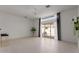 Bright living room featuring a sliding glass door leading to an outdoor seating area at 7006 E Jensen St # 40, Mesa, AZ 85207