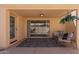 Covered patio with neutral colors, furniture, and a view to the backyard at 7006 E Jensen St # 40, Mesa, AZ 85207