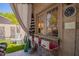 Outdoor patio featuring a bar and seating area with access to a small yard at 7315 E Arlington Rd, Scottsdale, AZ 85250