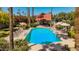 Inviting community pool with lounge chairs and well-maintained landscaping at 7315 E Arlington Rd, Scottsdale, AZ 85250