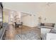 Open-concept living space with hardwood floors, recessed lighting, and a seamless flow to the kitchen at 7315 E Arlington Rd, Scottsdale, AZ 85250