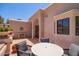 Spacious outdoor patio featuring terracotta tiles, decorative planters, and an inviting seating area at 7315 E Arlington Rd, Scottsdale, AZ 85250