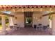 Community pool house featuring tiled floors, seating, and an open-air design at 7315 E Arlington Rd, Scottsdale, AZ 85250