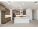 Modern kitchen features stainless steel appliances, subway tile backsplash, and quartz countertops at 7444 W Buckhorn Trl, Peoria, AZ 85383