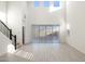 Bright living room showcasing the tall ceilings and ample light from the large windows at 7444 W Buckhorn Trl, Peoria, AZ 85383