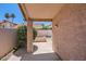 Covered patio featuring desert landscaping and stucco walls at 7709 W Tonto Dr, Glendale, AZ 85308