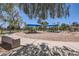 Community playground with covered play structures, swings, and soft ground cover for safe play at 7709 W Tonto Dr, Glendale, AZ 85308