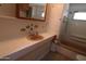 Efficient bathroom features a shower-tub combo at 7807 E Main St # F-35, Mesa, AZ 85207