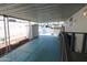 Covered patio with blue flooring, iron railing, and shade at 7807 E Main St # F-35, Mesa, AZ 85207