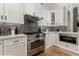 Chef's kitchen with stainless steel appliances, custom cabinetry, and modern fixtures at 8419 E Rancho Vista Dr, Scottsdale, AZ 85251