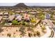 A high angle aerial view showcasing the backyard with the putting green of the home at 8804 E Ivy St, Mesa, AZ 85207