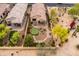 Aerial view featuring a backyard with a putting green, patio, and outdoor entertaining area at 8804 E Ivy St, Mesa, AZ 85207