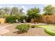 Inviting backyard featuring a putting green and seating areas at 8804 E Ivy St, Mesa, AZ 85207