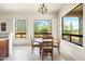Cozy breakfast nook with natural light and backyard views at 8804 E Ivy St, Mesa, AZ 85207
