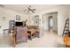 Bright living room with tile floors, an arched doorway, and comfortable seating at 8804 E Ivy St, Mesa, AZ 85207