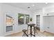 Cozy breakfast nook with a small table, two chairs, and natural light, perfect for enjoying casual meals at 9110 W Palm Ln, Phoenix, AZ 85037