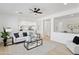 Inviting living room featuring an open layout and contemporary furnishings at 9110 W Palm Ln, Phoenix, AZ 85037