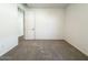Clean and bright bedroom with neutral carpet and fresh white walls at 9547 W Parkway Dr, Tolleson, AZ 85353