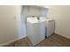 Convenient laundry area featuring a white washer and dryer at 9547 W Parkway Dr, Tolleson, AZ 85353