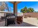 Outdoor patio with BBQ and fire pit is perfect for entertaining in the backyard at 10225 W Camelback Rd # 3, Phoenix, AZ 85037
