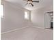 Bright, carpeted bedroom with plenty of light and an open ensuite bathroom at 10225 W Camelback Rd # 3, Phoenix, AZ 85037