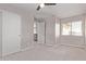 This bedroom has neutral walls and carpet and natural lighting at 10225 W Camelback Rd # 3, Phoenix, AZ 85037